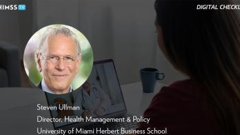 Steven Ullman at the University of Miami_ Telehealth on laptop photo: David Espejo/Getty Images